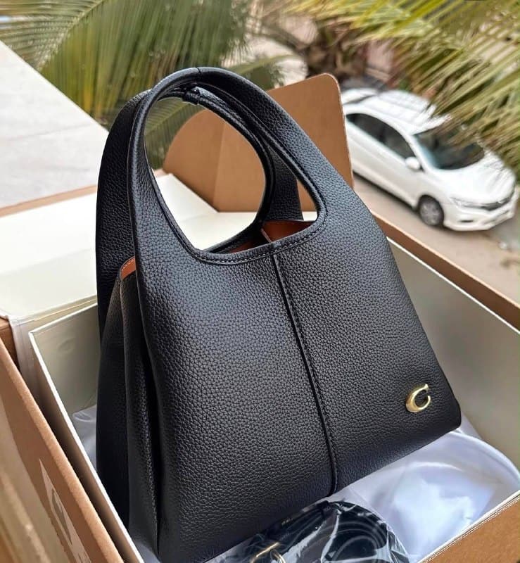 Enlace Hacoo Bolso Coach · foto 4